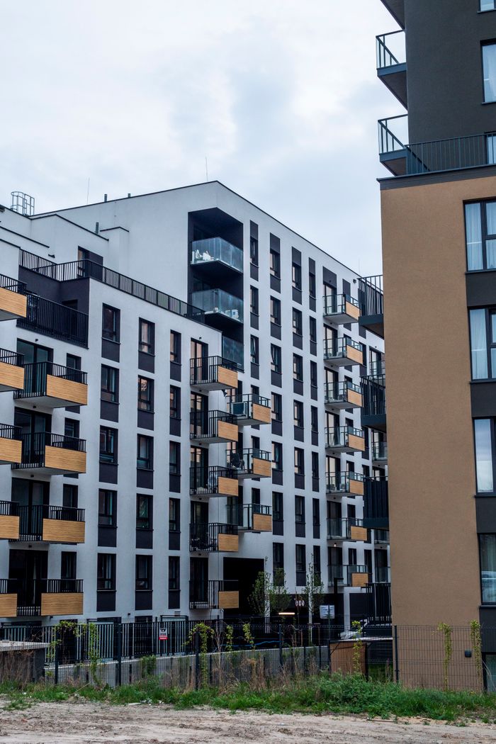 services-01 Contemporary apartment blocks showcasing modern architectural design in urban setting.